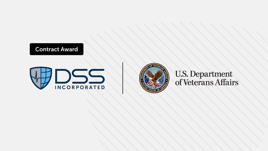 Contract award announcement showing DSS Incorporated logo (shield with globe) alongside U.S. Department of Veterans Affairs official seal and name on a light diagonal striped background