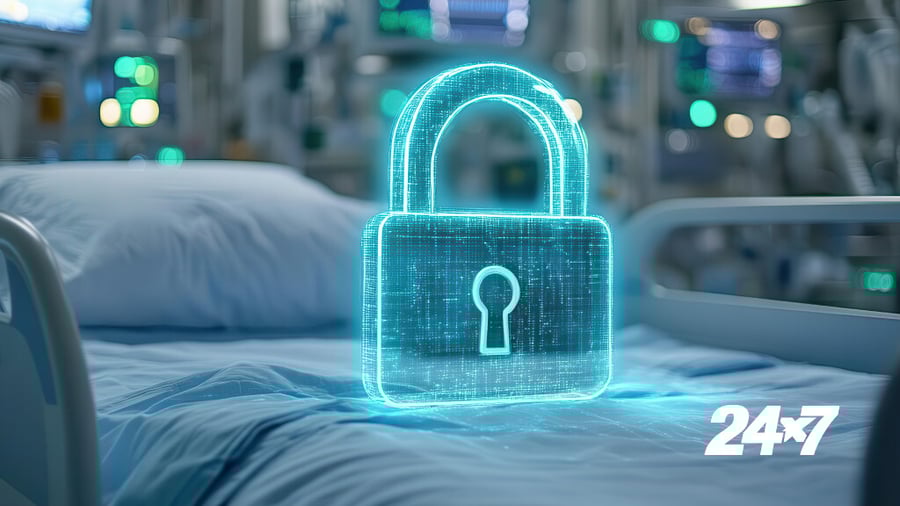  A glowing digital padlock hologram hovers over a hospital bed, representing 24x7 healthcare data security in a clinical environment.